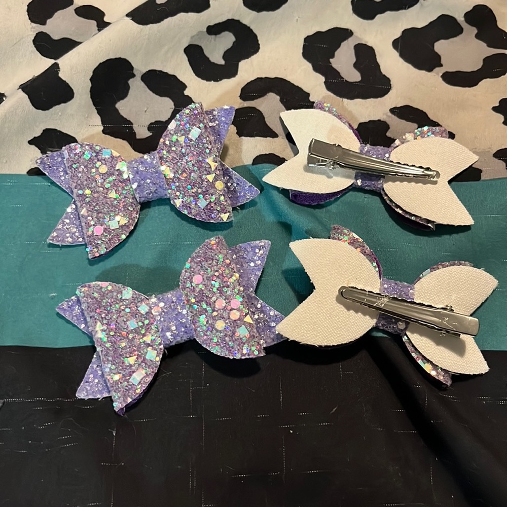 Four Glittery Purple Bows with alligator clips